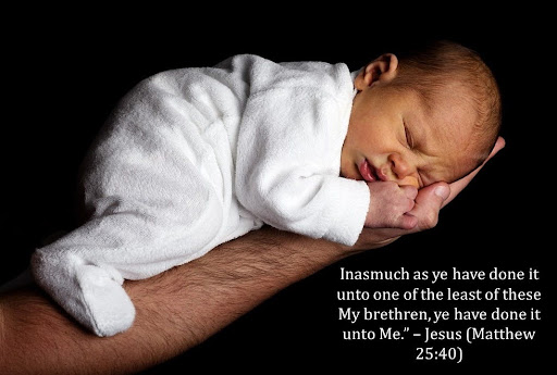 Small baby sleeping on an outstretched hand with a quote of Matthew 25:40.